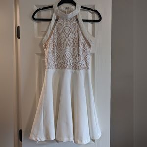 Boutique size 4 White Dress with Tulle underlay.